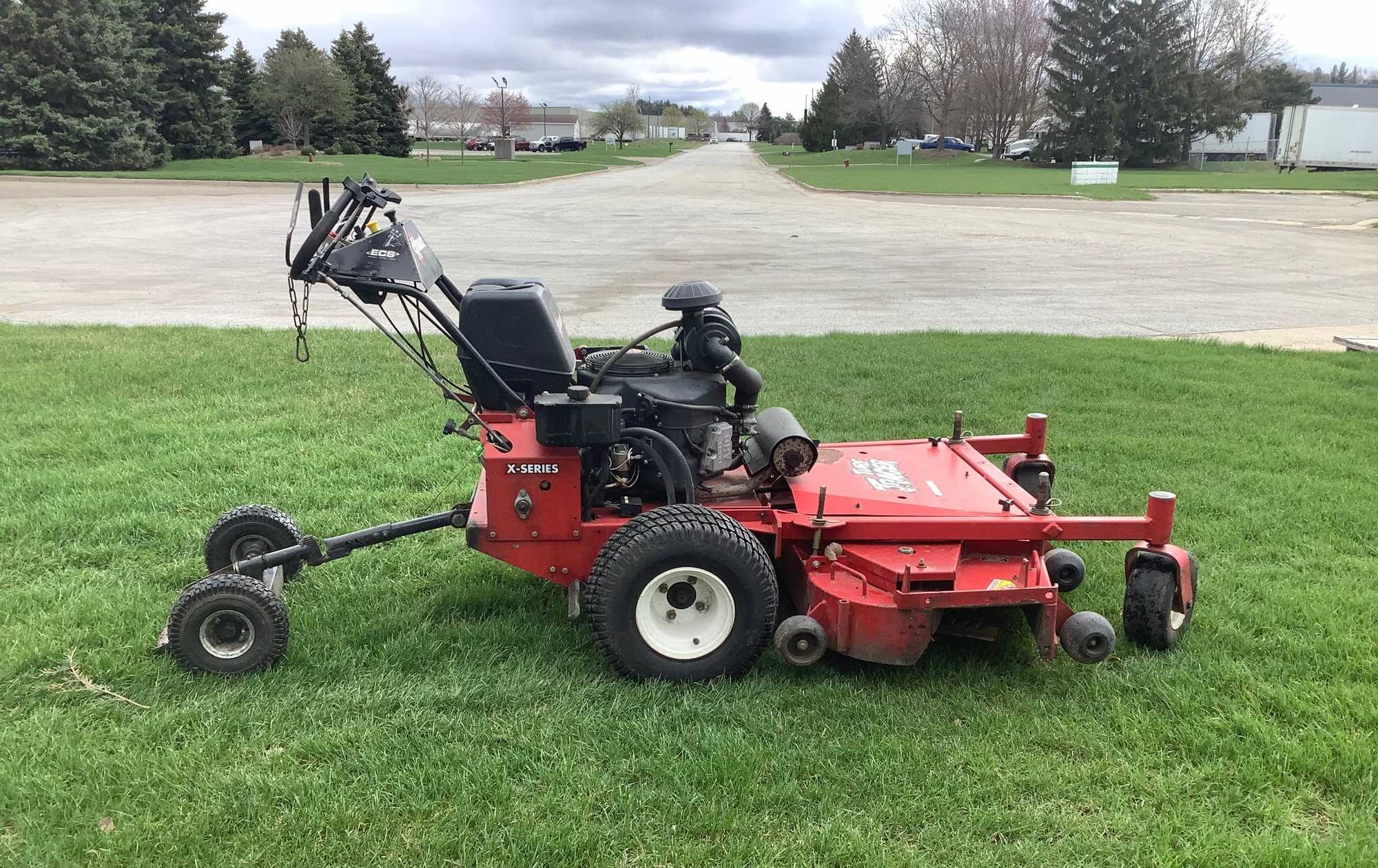 Exmark Turf Tracker Walk behind mower - Repo Finder