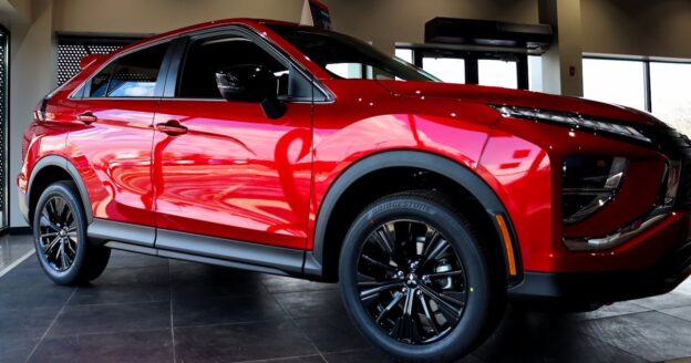 Red used vehicle at dealership